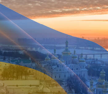 Ukraine cityscape with flag overlay