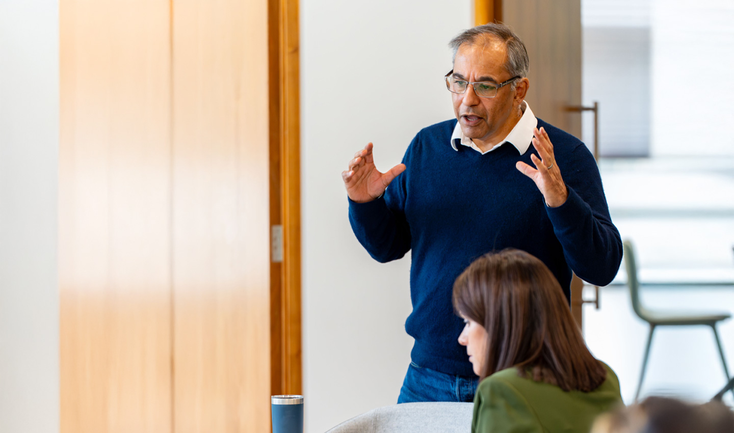 Group Chief Operating Officer 'Jon Kandiah' articulating an inspirational idea.