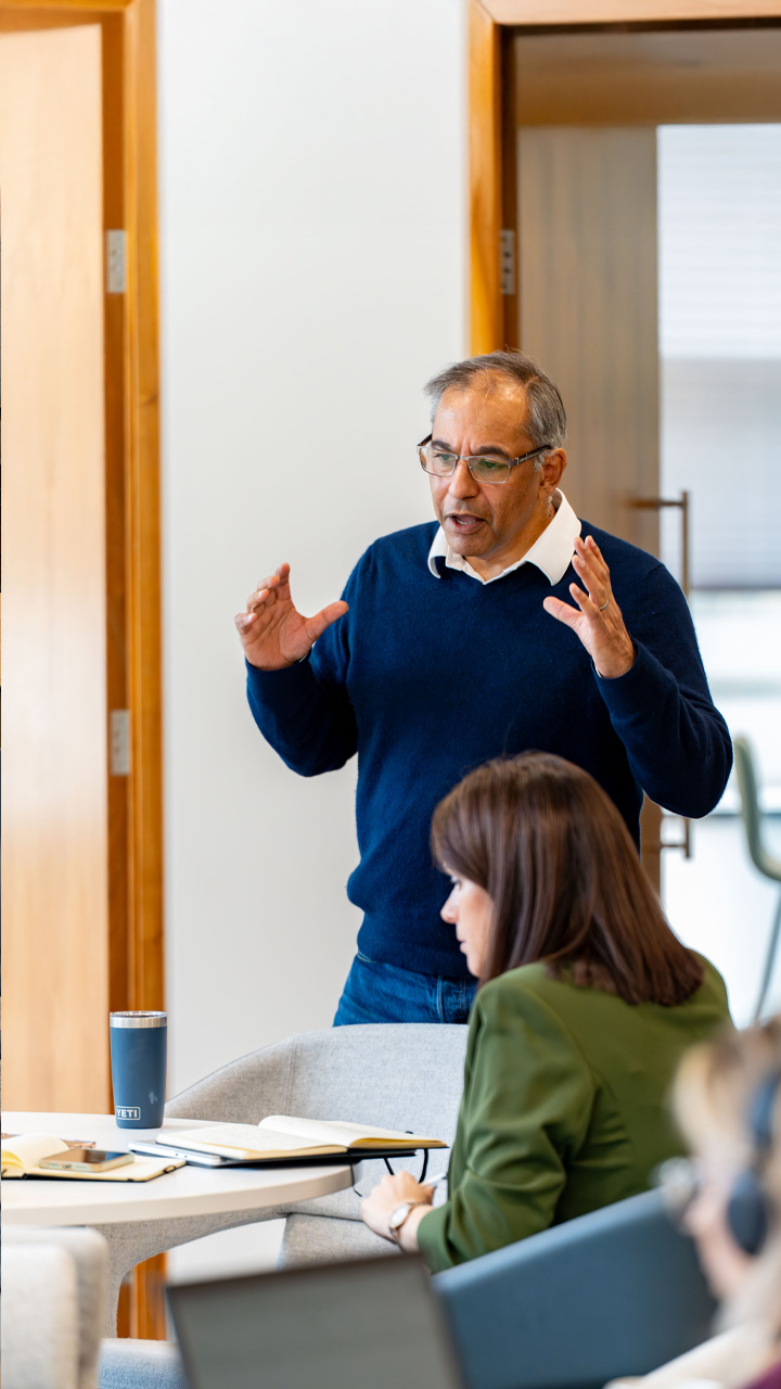 Group Chief Operating Officer 'Jon Kandiah' articulating an inspirational idea.