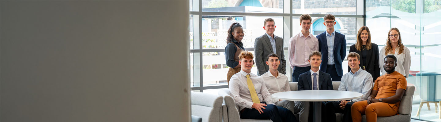 BDO Bursary student team photo in a bright modern office