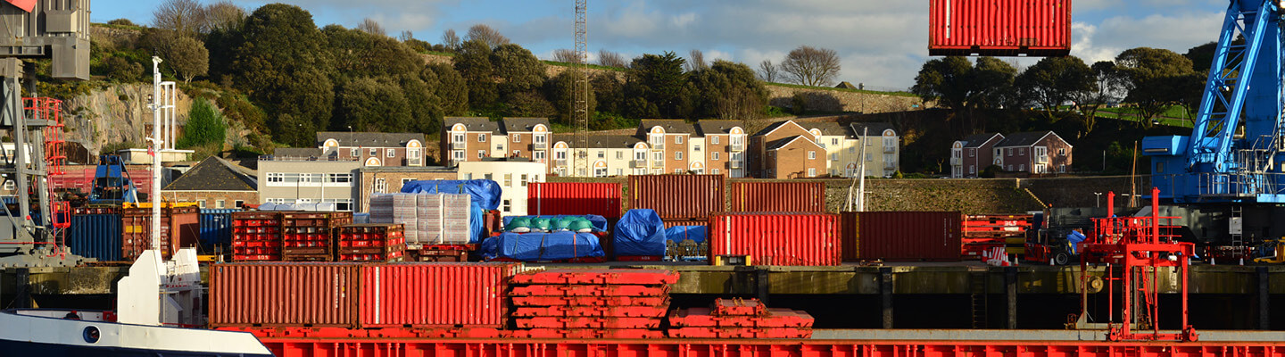A Ship being unloaded in St Helier Harbour