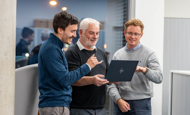 Transformation & Change Team Members Chat in the Office