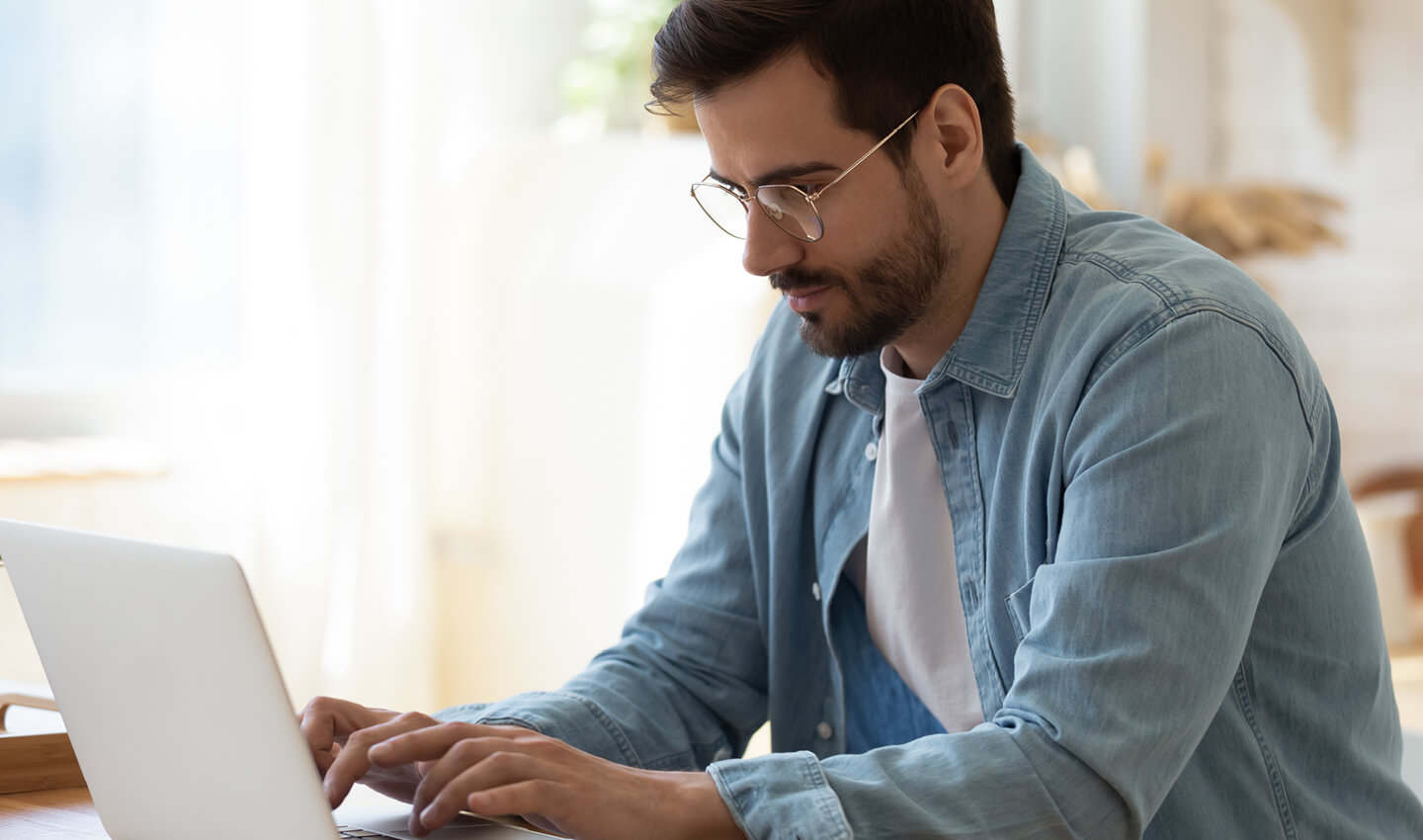 A man working from home on his laptop