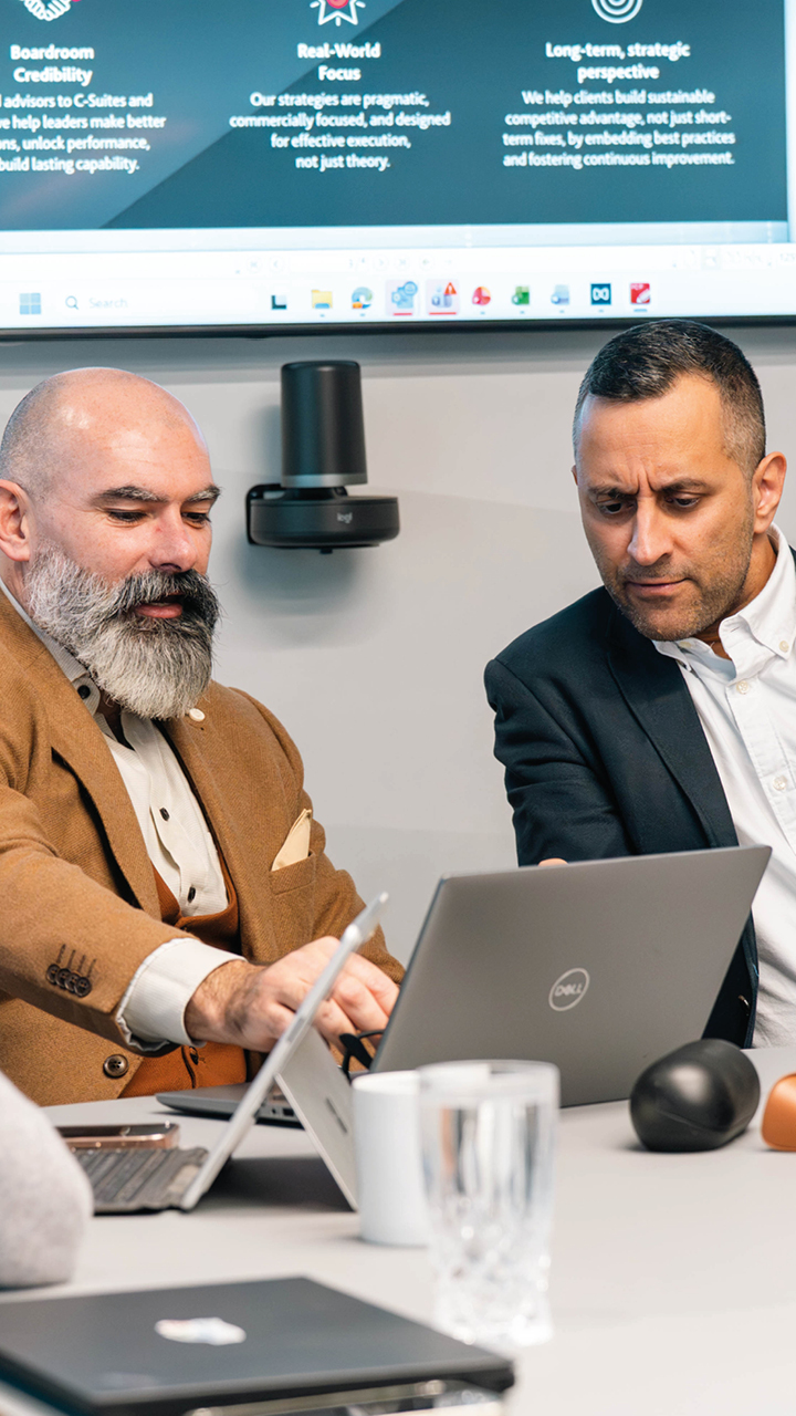 Picture of risk consultants talking