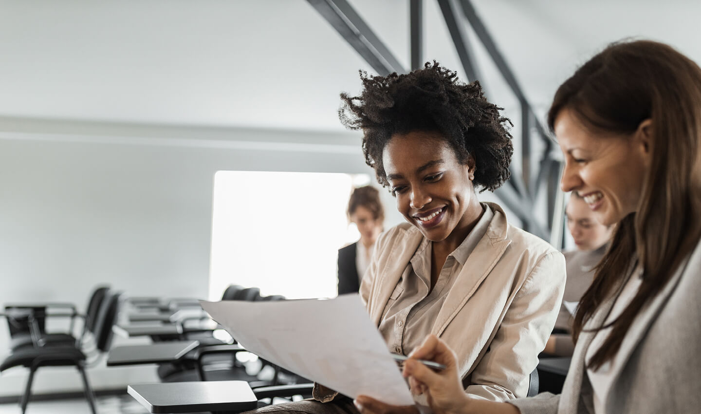 2 accountants reviewing documents